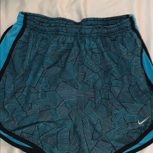 Blue and black running shorts
